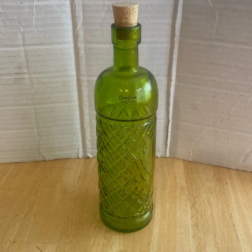 Beautiful green glass decorative or useful bottle. Made in Spain. NWOT.